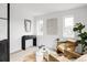 Cozy living room with stylish decor, comfortable seating, and a modern glass coffee table at 4481 Raleigh St, Denver, CO 80211