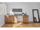 Modern wet bar with light wood cabinets and sleek countertops at 2947 S Elati St, Englewood, CO 80110