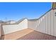 Private patio with brick flooring and fencing provides a serene outdoor space for relaxation and enjoyment at 18366 E 102Nd Pl, Commerce City, CO 80022