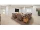 Finished basement featuring recessed lights, comfortable seating, and ample space at 14032 E Chenango Dr, Aurora, CO 80015
