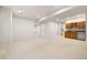 Finished basement offers additional living space with a wet bar at 14032 E Chenango Dr, Aurora, CO 80015