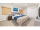 Comfortable bedroom featuring a plush bed, stylish decor, and plenty of natural light at 14032 E Chenango Dr, Aurora, CO 80015
