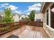 Spacious wood deck overlooking the backyard, perfect for outdoor entertaining and relaxation at 14032 E Chenango Dr, Aurora, CO 80015