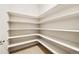 Well-organized pantry with shelving providing plenty of storage for kitchen essentials at 14032 E Chenango Dr, Aurora, CO 80015