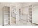 Spacious walk-in closet with custom shelving and ample storage space for an organized wardrobe at 14032 E Chenango Dr, Aurora, CO 80015
