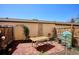 Inviting backyard featuring a brick patio, garden area and a table, perfect for outdoor entertaining at 16046 E Ithaca Pl # C, Aurora, CO 80013