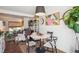 Stylish dining space with hardwood floors, contemporary decor, and an open layout, great for entertaining guests at 16046 E Ithaca Pl # C, Aurora, CO 80013