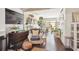 Stylish living area with an open floor plan, modern decor, and hardwood floors, perfect for entertaining at 16046 E Ithaca Pl # C, Aurora, CO 80013