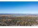 Wide aerial shot of the neighborhood showing the homes, landscape, and distant mountain range at 3695 S Kittredge St # D, Aurora, CO 80013