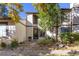 Inviting townhome exterior with mature landscaping and a well-maintained facade at 3695 S Kittredge St # D, Aurora, CO 80013