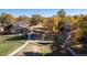 Community landscaping, including a bridge over a stream, and well-maintained lawns at 3695 S Kittredge St # D, Aurora, CO 80013