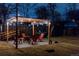 Backyard with pergola and patio set for outdoor relaxation and evening enjoyment at 2465 W Mosier Pl, Denver, CO 80223