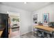 Open kitchen with stainless steel appliances and a view into the living area at 2465 W Mosier Pl, Denver, CO 80223