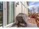 Outdoor patio area with BBQ grill, perfect for entertaining and accessed through sliding glass doors at 3082 W 107Th Pl # H, Westminster, CO 80031