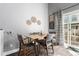 Bright dining area with stylish decor, a table, chairs and plenty of natural light at 3082 W 107Th Pl # H, Westminster, CO 80031