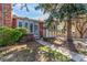 Charming home exterior with brick accents, large windows, well-maintained lawn, and inviting walkway at 3082 W 107Th Pl # H, Westminster, CO 80031