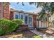 Beautiful home exterior featuring brick accents, large windows, a well-kept lawn, and a welcoming entryway at 3082 W 107Th Pl # H, Westminster, CO 80031