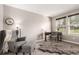 Cozy room with an office desk, chair and plush chair at 3082 W 107Th Pl # H, Westminster, CO 80031