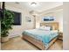 Comfortable bedroom with cozy carpet, stylish decor, and ample natural light from the window at 3532 Springbriar Dr, Castle Rock, CO 80109