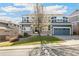 Beautiful two-story home with a well-manicured lawn and a spacious two-car garage at 3532 Springbriar Dr, Castle Rock, CO 80109