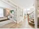 Spacious foyer leading to a home office and staircase, with tile flooring and natural light at 3532 Springbriar Dr, Castle Rock, CO 80109