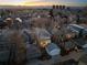 Aerial view of the home and neighborhood featuring city views in the distance at 652 S Race St, Denver, CO 80209