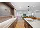 Open basement area with bar, countertop, and entertainment space at 652 S Race St, Denver, CO 80209