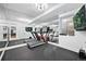 Home gym with mirrors and modern exercise equipment at 652 S Race St, Denver, CO 80209