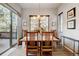 Bright dining room with hardwood floors and access to deck at 1745 Holmby Ct, Castle Rock, CO 80104