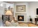 Living room featuring a beautiful stone fireplace at 1745 Holmby Ct, Castle Rock, CO 80104