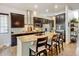 Modern kitchen with dark cabinetry and an island at 1745 Holmby Ct, Castle Rock, CO 80104