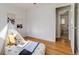 Bright bedroom with hardwood floors, a tent and ensuite bathroom is perfect for relaxation at 500 Fulton St, Aurora, CO 80010