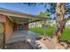 Inviting covered patio perfect for outdoor entertaining with views of the expansive backyard at 500 Fulton St, Aurora, CO 80010
