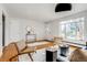 Spacious living room with hardwood floors, modern seating, and a bright, airy feel at 500 Fulton St, Aurora, CO 80010