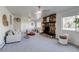 Cozy living room featuring a unique stone fireplace and an airy, open layout at 500 Fulton St, Aurora, CO 80010