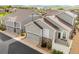 Beautiful townhome exterior features stone accents, a 2-car garage, and meticulous landscaping at 5723 S Union Ct, Littleton, CO 80127