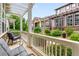 Inviting front porch with comfortable seating and views of the landscaped yard at 5723 S Union Ct, Littleton, CO 80127
