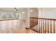 Spacious living room with hardwood floors and large windows for ample natural light at 5723 S Union Ct, Littleton, CO 80127