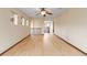 Spacious living room with hardwood floors and large windows for ample natural light at 5723 S Union Ct, Littleton, CO 80127
