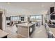 Spacious kitchen with a large island, stainless steel appliances, and an open view to the living area at 14147 Bunny Hop Ln, Parker, CO 80134