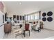 Bright living room featuring modern furniture, large windows, and stylish decor creating an inviting atmosphere at 14147 Bunny Hop Ln, Parker, CO 80134