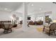 Spacious finished basement with multiple seating areas and stylish decor at 14582 Mission Walk Loop, Parker, CO 80134
