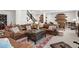 Basement area featuring a large seating area, accent walls, and plenty of room for entertaining at 14582 Mission Walk Loop, Parker, CO 80134