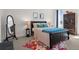 Charming bedroom with a comfortable bed, stylish decor, and plenty of natural light at 14582 Mission Walk Loop, Parker, CO 80134