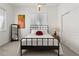 Well-lit bedroom featuring neutral walls and a minimalist design at 14582 Mission Walk Loop, Parker, CO 80134
