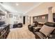Spacious carpeted basement with reclining leather chairs, pool table and various forms of entertaiment at 10694 Cedarcrest Cir, Highlands Ranch, CO 80130