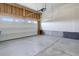 Spacious two-car garage interior with high ceilings and plenty of room for storage at 3961 Happy Hollow Dr, Castle Rock, CO 80104