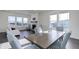 Bright living room with modern finishes, a fireplace, and plenty of natural light at 3961 Happy Hollow Dr, Castle Rock, CO 80104