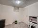 Finished basement featuring plush carpeting, updated windows and a toy kitchen at 7112 S Platte Canyon Dr, Littleton, CO 80128