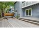 Spacious backyard deck and mature trees and landscaping at 8056 Meadowdale Sq, Niwot, CO 80503